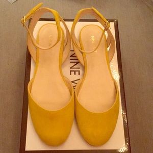 Yellow suede ankle strap flats